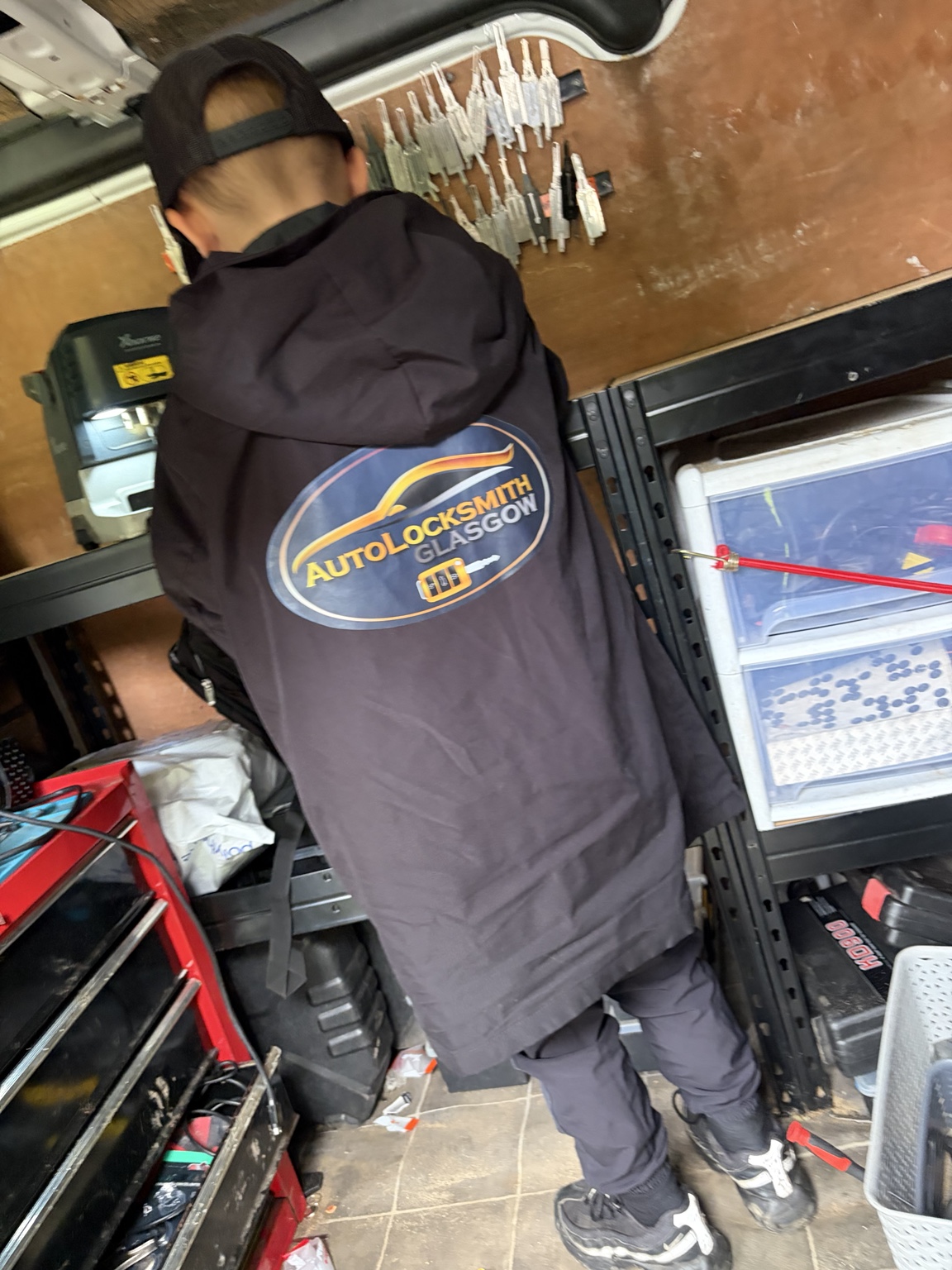 Autolocksmith Glasgow locksmith at the van with a full stock of car key blanks and equipment